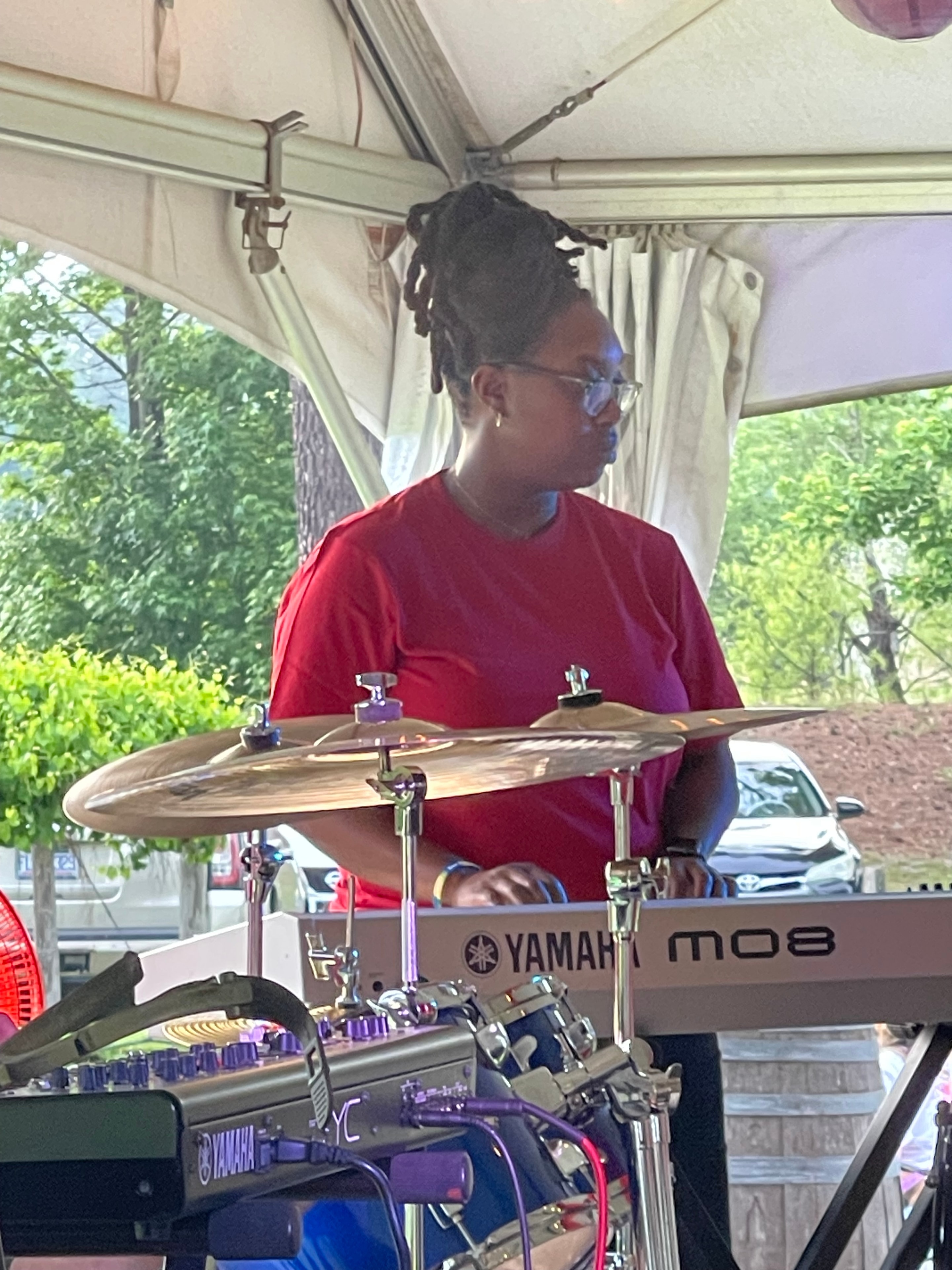 TCB guitarist performing